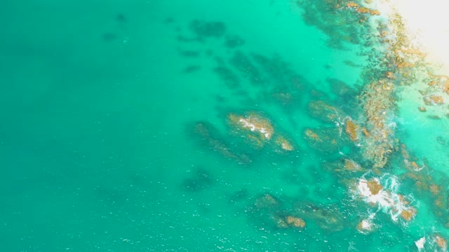 DREAMS LOS CABOS BCS MEXICO-2021: Turquoise Ocean Waves Crashing on Rocky Shore