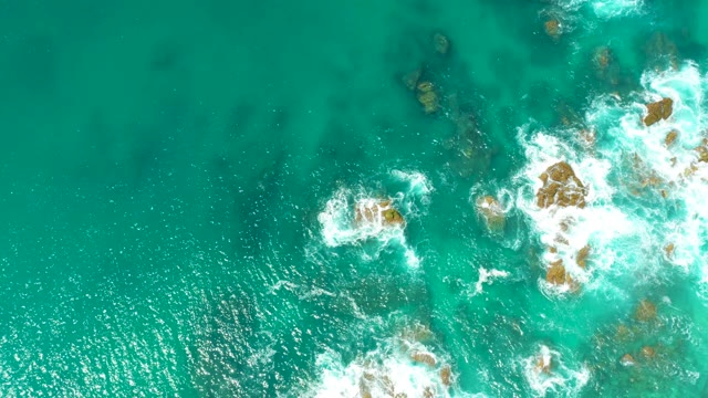 DREAMS LOS CABOS BCS MEXICO-2021: Ocean Waves Crashing Against Rocky Outcrops