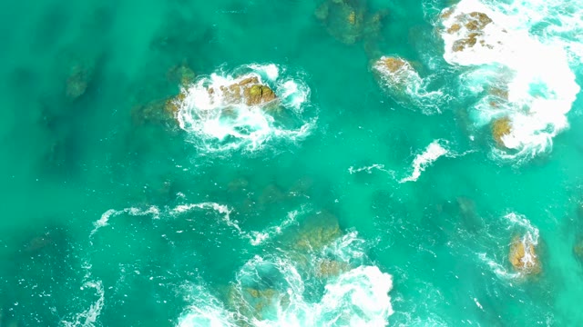 DREAMS LOS CABOS BCS MEXICO-2021: Waves Crashing on Rocky Ocean Surface