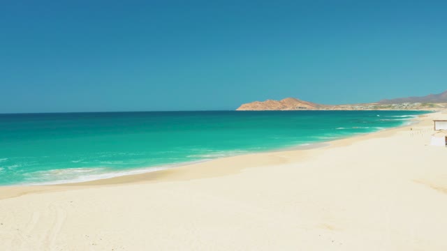 DREAMS LOS CABOS BCS MEXICO-2021: Sandy Beach with Turquoise Ocean and Distant Hills