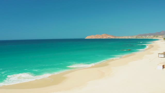 DREAMS LOS CABOS BCS MEXICO-2021: Gentle Waves Rolling Onto Sandy Shore