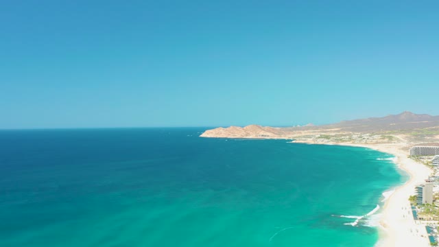 DREAMS LOS CABOS BCS MEXICO-2021: Gentle Ocean Waves Lapping Sandy Beach