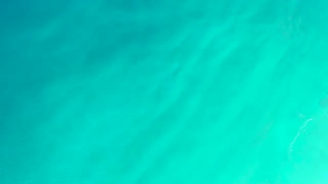 DREAMS LOS CABOS BCS MEXICO-2021: Gentle Waves in Shallow Turquoise Ocean Water