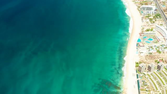 DREAMS LOS CABOS BCS MEXICO-2021: Wave Approaching Sandy Shore From Above