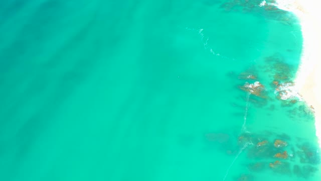 DREAMS LOS CABOS BCS MEXICO-2021: Turquoise Ocean Water Lapping at Sandy Shoreline