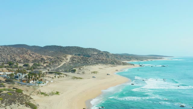 SAN LUIS BEACH EAST CAPE LOS CABOS MEXICO-2021: Coastal Landscape with Moving Ocean Waves and Sandy Shore