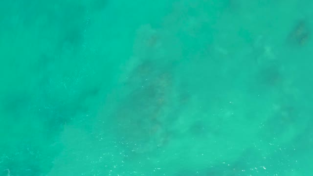 SAN LUIS BEACH EAST CAPE LOS CABOS MEXICO-2021: Bubbles Rising From Ocean Floor in Clear Turquoise Water