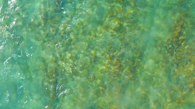SAN LUIS BEACH EAST CAPE LOS CABOS MEXICO-2021: Clear Turquoise Water with Underwater Rocks and Ripples