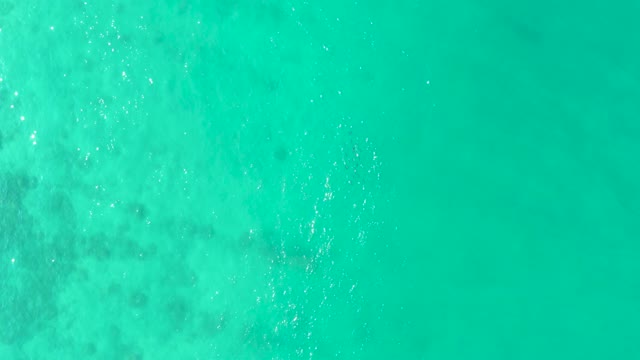 LOS FRALIES LOS CABOS BCS MEXICO-2021: Shimmering Turquoise Ocean Surface From Above