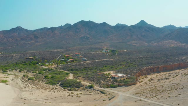 LOS FRALIES LOS CABOS BCS MEXICO-2021: Desert Road Winding Through Arid Terrain