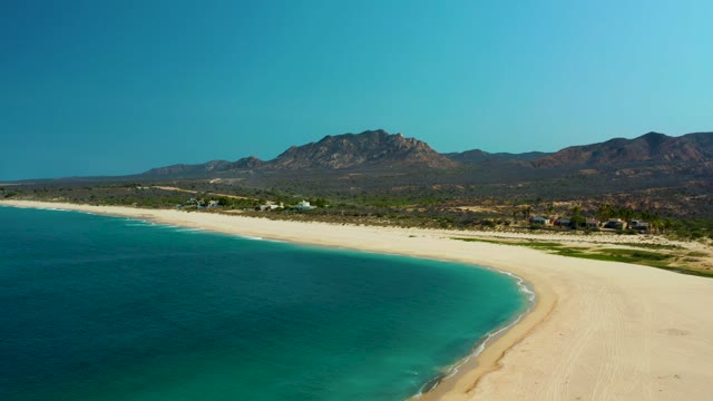 LOS FRALIES LOS CABOS BCS MEXICO-2021: Sandy Beach and Turquoise Ocean with Vanishing Vehicle