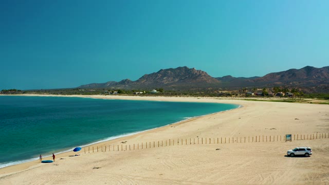 LOS FRALIES LOS CABOS BCS MEXICO-2021: Sandy Beach with Turquoise Water and Distant Mountains