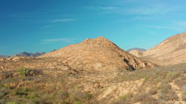 CABO PULMO BCS MEXICO-2021: Desert Landscape with Rocky Hills and Dry Shrubs