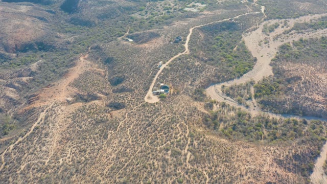 CABO PULMO BCS MEXICO-2021: Vehicle Moving on a Dry Hilly Dirt Road