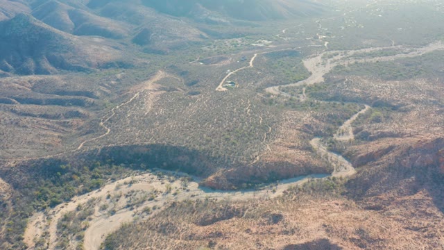 CABO PULMO BCS MEXICO-2021: Vehicles Driving on a Winding Desert Mountain Road