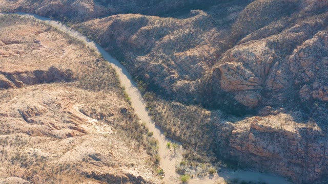 CABO PULMO BCS MEXICO-2021: River Winding Through Arid Rocky Terrain