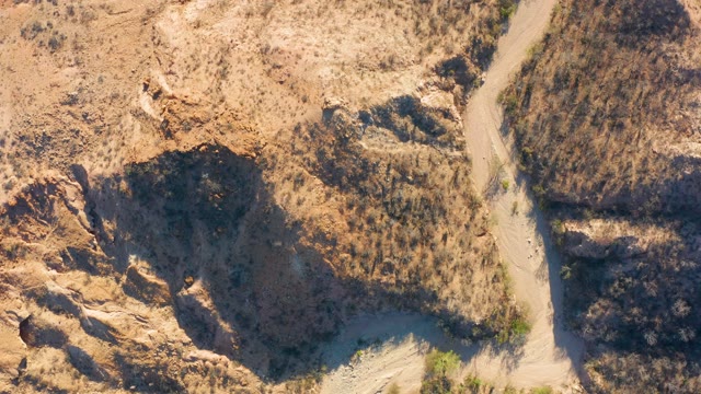 CABO PULMO BCS MEXICO-2021: Dirt Road Winding Through Arid Rocky Terrain