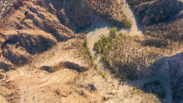 CABO PULMO BCS MEXICO-2021: Winding Mountain Dirt Road in Arid Landscape