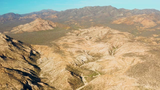 CABO PULMO BCS MEXICO-2021: Aerial Pan Over Arid Mountain Valleys
