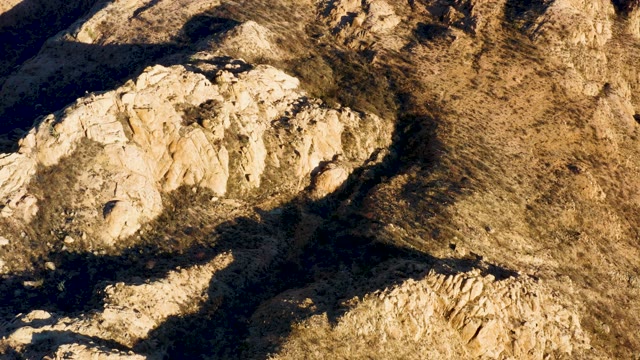 CABO PULMO BCS MEXICO-2021: Rugged Rock Formations Under Shifting Shadows