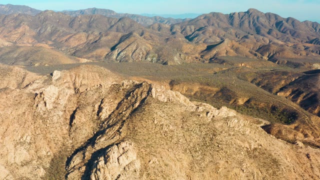 CABO PULMO BCS MEXICO-2021: Aerial Pan of Mountain Valley and Rocky Peaks