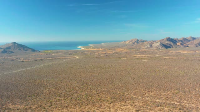 CABO PULMO BCS MEXICO-2021: Desert Plain with Mountains and Ocean Horizon
