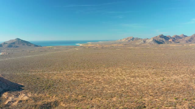 CABO PULMO BCS MEXICO-2021: Desert Plain with Distant Ocean and Mountains