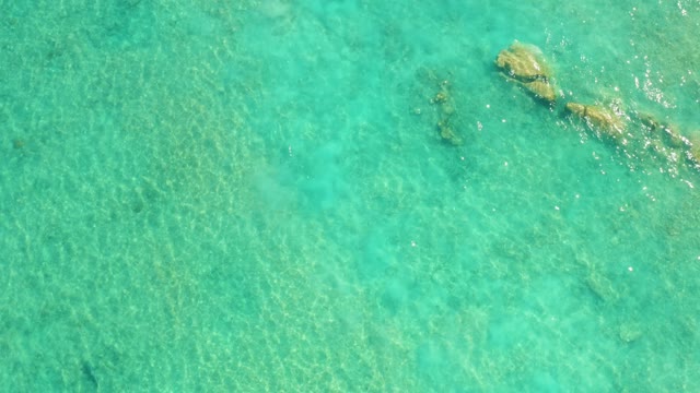 Clear Turquoise Water with Underwater Rock Formations