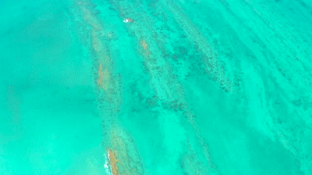 Submerged Structures in Clear Turquoise Ocean