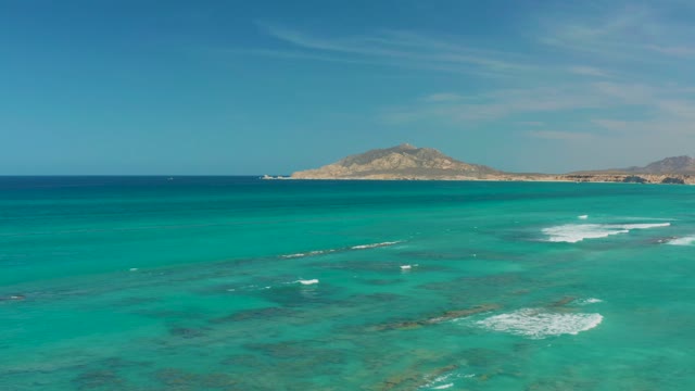 CABO PULMO BCS MEXICO-2021: Gentle Waves Breaking Over Shallow Turquoise Ocean