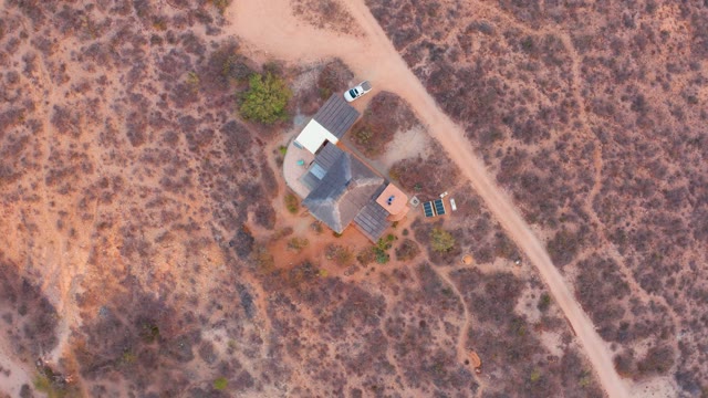 CABO PULMO BCS MEXICO-2021: Desert House with Moving Figure near Structure