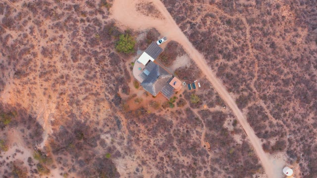 CABO PULMO BCS MEXICO-2021: Car Driving on Desert Dirt Road near House