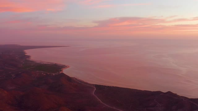 CABO PULMO BCS MEXICO-2021: Sunset Over Mountainous Coast and Winding Road