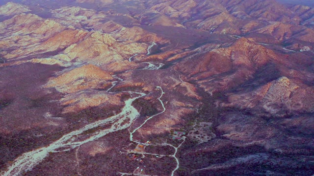 CABO PULMO BCS MEXICO-2021: Vehicle Traveling Along Winding River in Desert Valley
