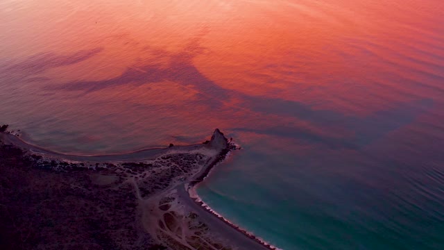 CABO PULMO BCS MEXICO-2021: Coastal Sunset with Turquoise Waters and Breakwater