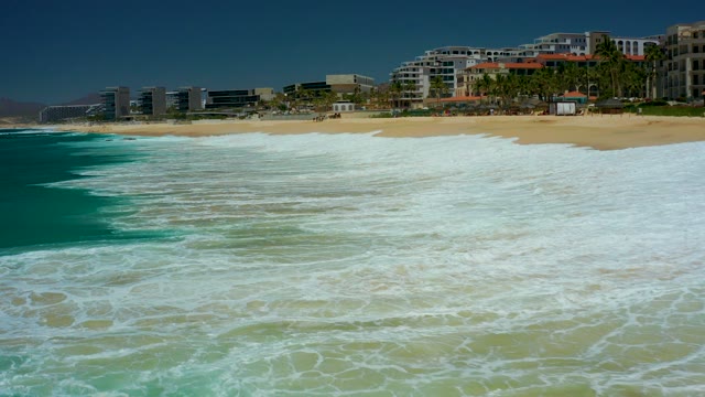 MARQUIS LOS CABOS BCS MEXICO-2021: Waves Crashing Onto Sandy Beach Shoreline
