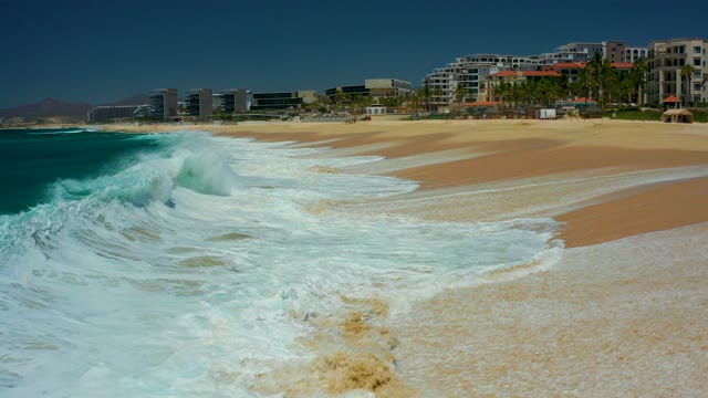 MARQUIS LOS CABOS BCS MEXICO-2021: Ocean Waves Crashing Onto Sandy Shore