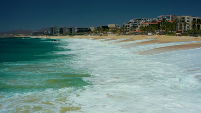 MARQUIS LOS CABOS BCS MEXICO-2021: Waves Rolling Onto a Sandy Beach