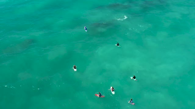 MARQUIS LOS CABOS BCS MEXICO-2021: Surfers Waiting for Waves in Clear Turquoise Water
