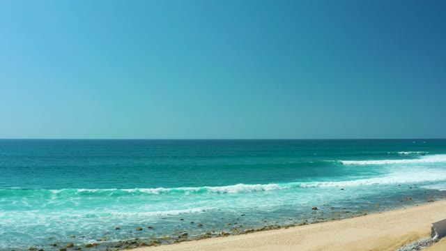 MARQUIS LOS CABOS BCS MEXICO-2021: Gentle Ocean Waves Rolling Onto Sandy Shore