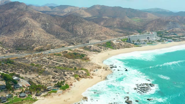 MARQUIS LOS CABOS BCS MEXICO-2021: Vehicle Moving on Coastal Road by Ocean Waves