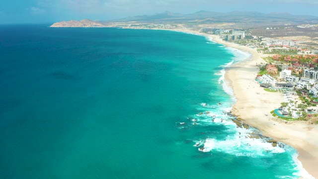 MARQUIS LOS CABOS BCS MEXICO-2021: Waves Crashing on Sandy Coastal Shore