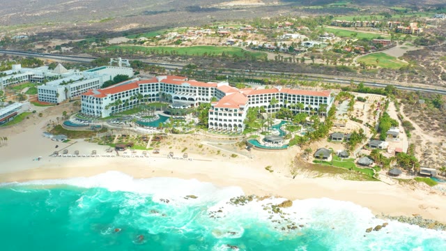 MARQUIS LOS CABOS BCS MEXICO-2021: Ocean Waves Lapping a Sandy Beach Resort