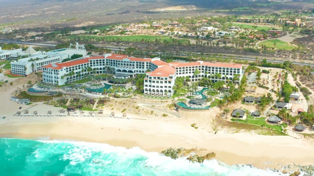 MARQUIS LOS CABOS BCS MEXICO-2021: Beach Resort with Ocean Waves and Red-Roofed Buildings