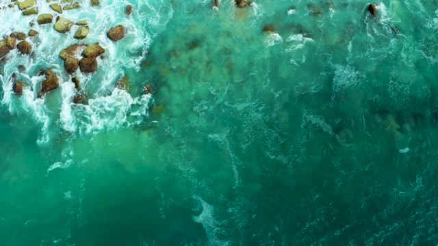 MARQUIS LOS CABOS BCS MEXICO-2021: Waves Crashing Against Rocky Shore From Above