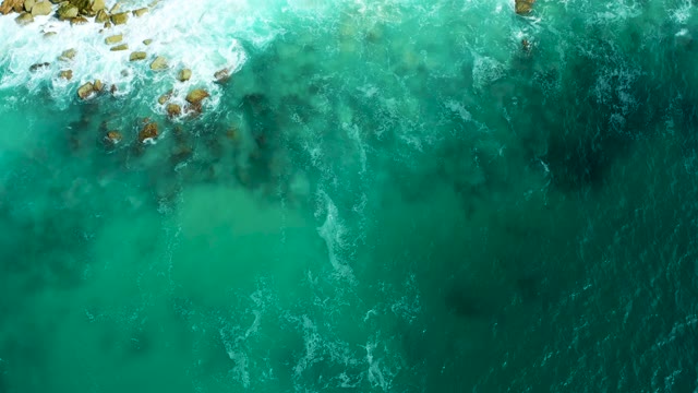 MARQUIS LOS CABOS BCS MEXICO-2021: Waves Breaking on Rocky Ocean Shore Aerial