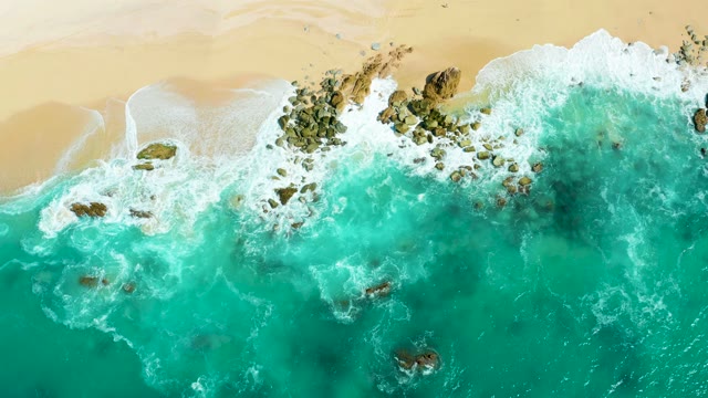 MARQUIS LOS CABOS BCS MEXICO-2021: Ocean Waves Breaking on Rocky Beach Shoreline