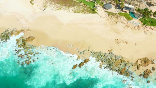 MARQUIS LOS CABOS BCS MEXICO-2021: Waves Breaking on Rocky Beach Shore