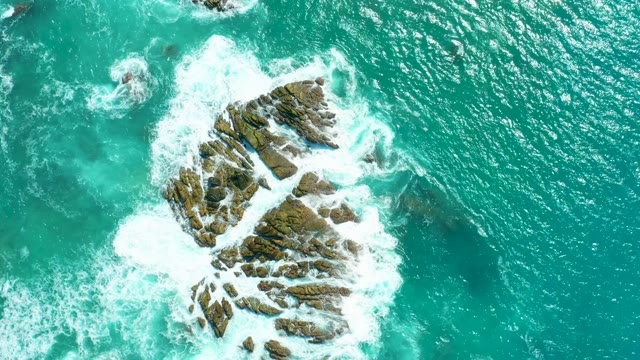 MARQUIS LOS CABOS BCS MEXICO-2021: Waves Crashing Against Rocky Ocean Outcrop