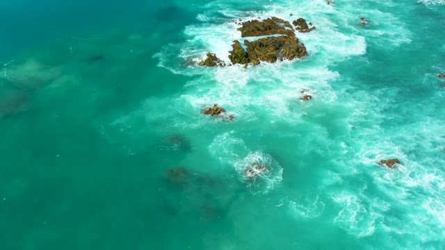 MARQUIS LOS CABOS BCS MEXICO-2021: Waves Crashing Against Rocky Ocean Outcrops